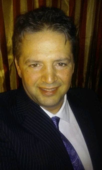 Portrait of Sam Dragu, CEO and founder of A+ Plus Detroit
