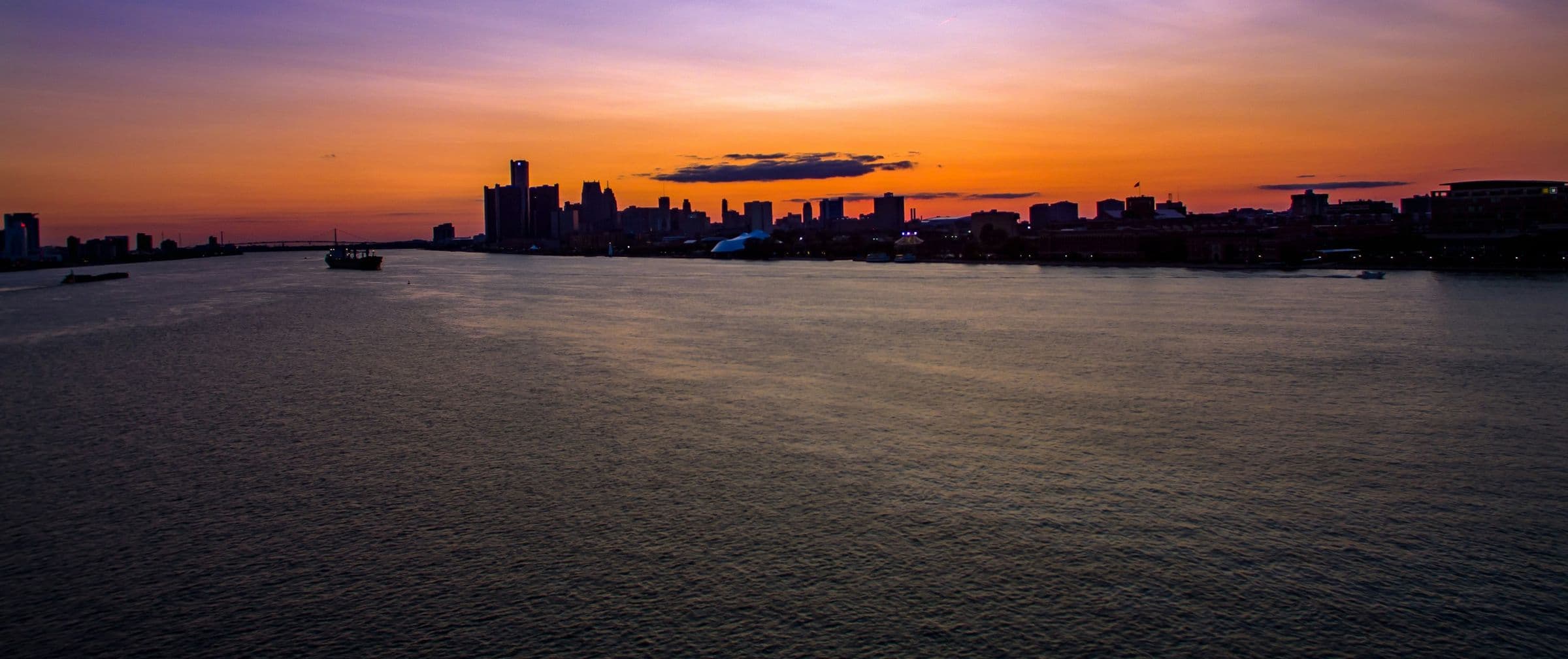 Detroit skyline across the river at golden hour